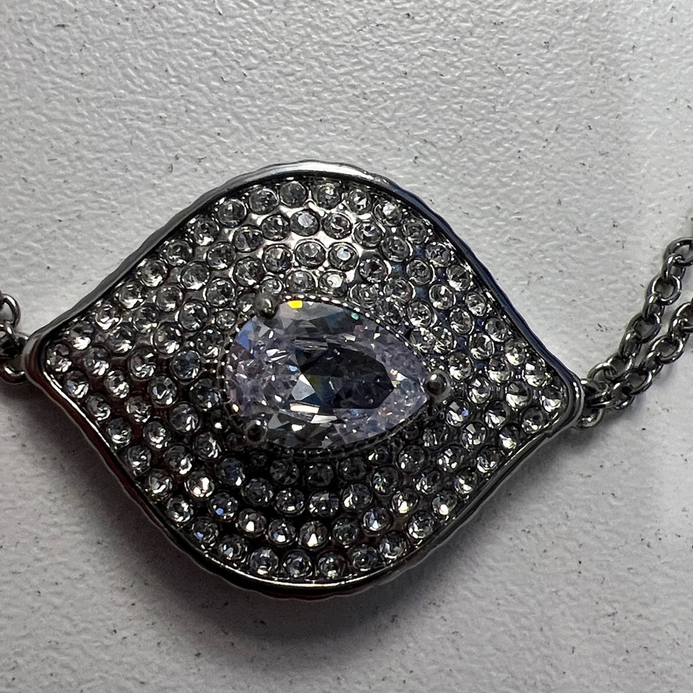 JTV JOAN BOYCE, GUNMETAL TONE
WITH WHITE CRYSTAL EVIL EYE
STATION BRACELET - Picture 3 of 7